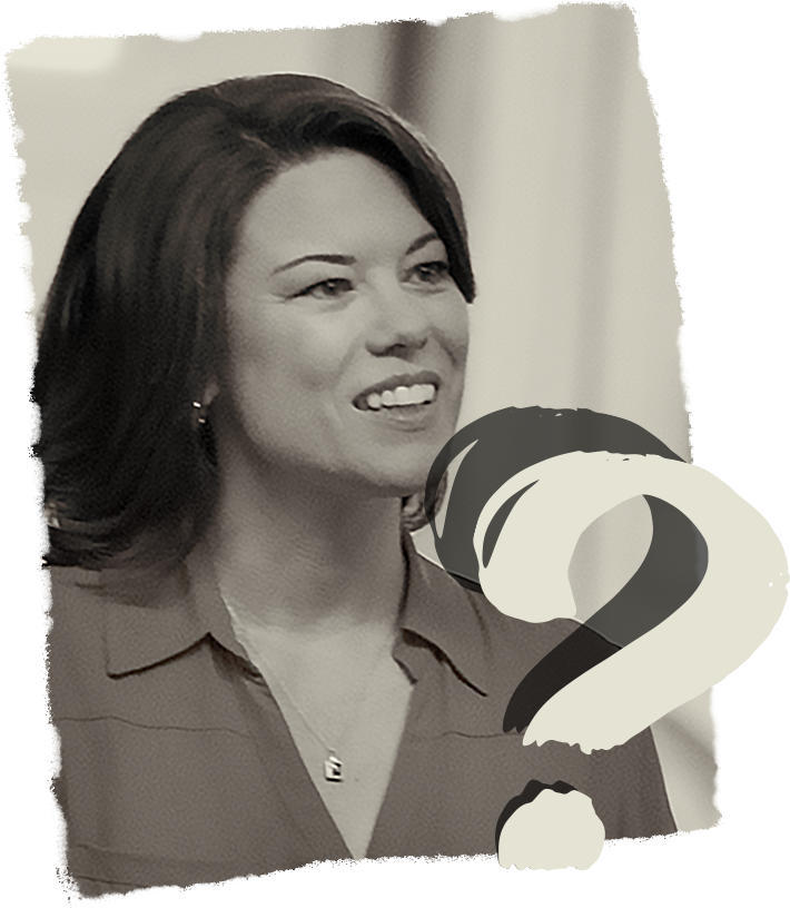 Angie Craig’s image on a desk, illuminated by a lamp